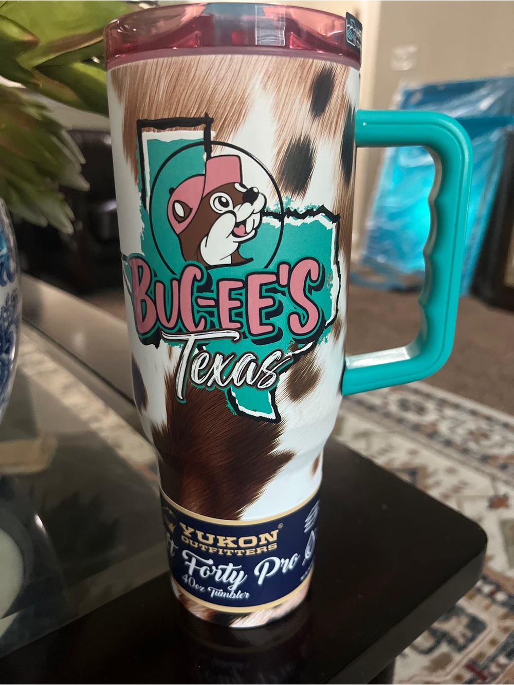 Buc-ee's Texas Cowhide Travel Mug with Teal Handle